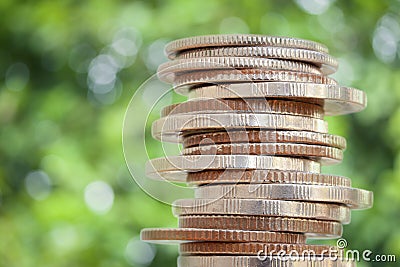 Financial and business background for Row of money coins on bokeh background. Savings and Accounts, Finance Banking Business Ideas Stock Photo