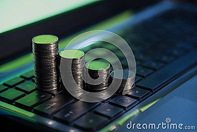 Financial business money coins on keyboard, online stock trade, Stock Photo