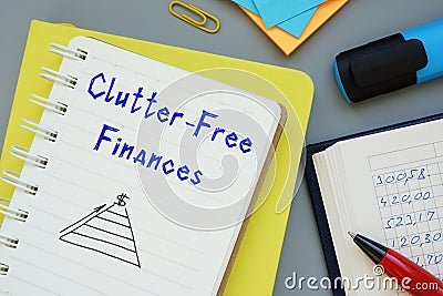 Financial concept about Clutter-Free Finances with sign on the page Stock Photo