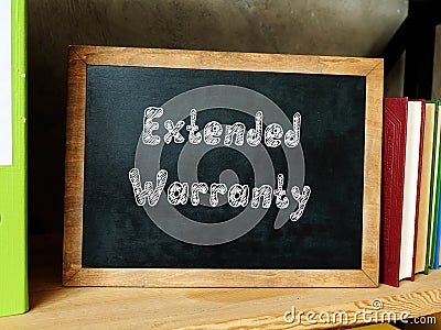 Financial concept about Extended Warranty with inscription on the piece of paper Stock Photo