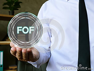 Financial concept about Fund of Funds FOF with sign on the page Stock Photo