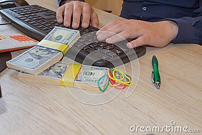 Financial concept. Make money on the Internet. Businessman working with laptop in office Stock Photo