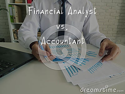 Financial concept meaning Financial Analyst vs. Accountant with inscription on the page Stock Photo