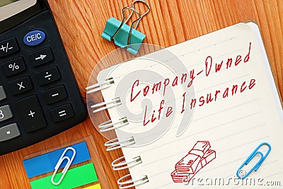 Financial concept meaning Company-Owned Life Insurance COLI with phrase on the piece of paper Stock Photo