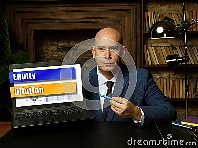 Financial concept meaning Equity Dilution with sign on laptop Stock Photo