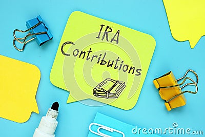 Financial concept meaning IRA Contributions with inscription on the page Stock Photo