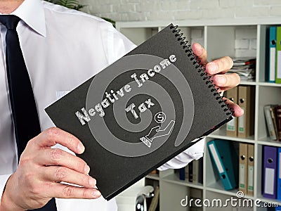 Financial concept meaning Negative Income Tax with phrase on the page Stock Photo