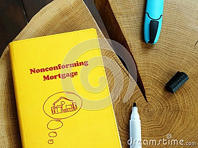 Financial concept meaning Nonconforming Mortgage with sign on the piece of paper Stock Photo