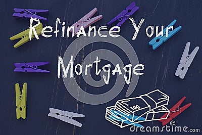 Financial concept meaning Refinance Your Mortgage with sign on the sheet Stock Photo