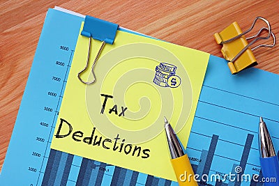 Financial concept meaning Tax Deductions with phrase on the page Stock Photo