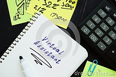 Financial concept meaning Virtual Assistant with phrase on the sheet Stock Photo