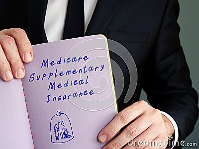 Financial concept about Medicare Supplementary Medical Insurance SMI with phrase on the sheet Stock Photo