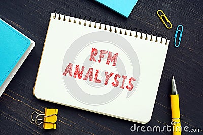 Financial concept about RFM ANALYSIS Recency Frequency Monetary with sign on the piece of paper. A marketing technique used to Stock Photo