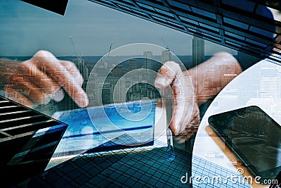 Financial district and man using tablet Stock Photo