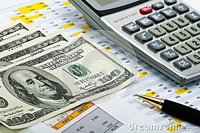 Financial forms with pen, calculator and money. Stock Photo