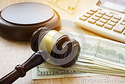 Financial fraud. White collar crime. Gavel, calculator and money. Stock Photo