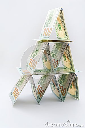 Financial growth concept, taxes. Pyramid of dollar banknotes. The financial pyramid, Money pyramid. Stock Photo