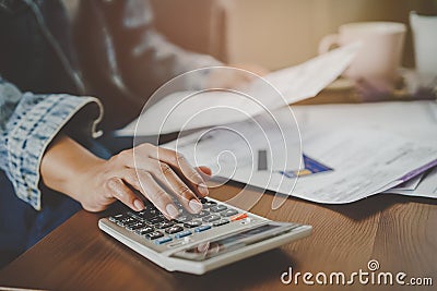 Financial household debt economy accounting concept. Close up hands of person calculating monthly expense and management Stock Photo