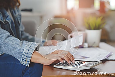 Financial debt economy accounting concept. Close up view hands of person calculating monthly expense and management Stock Photo