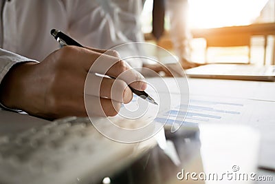 Financial inspector making report,insurance agent analyzing about home investment loan at office room Stock Photo