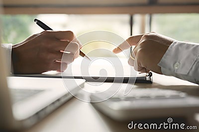 Financial inspector making report,insurance agent analyzing about home investment loan at office room Stock Photo