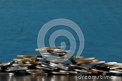 Financial instability expressed in coins Stock Photo