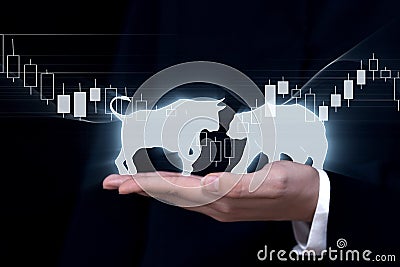 Financial investment background, drawing of a bull and a bear on the hand of a market maker on a candlestick chart, the concept of Stock Photo