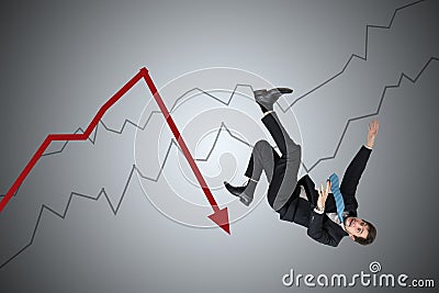 Financial loss and crisis concept. Young businessman is falling down from arrow Stock Photo