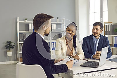 Financial manager, realtor or insurer consulting clients in modern office Stock Photo