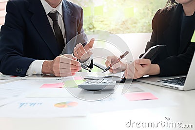 Financial planning Business man and Business woman talking to pl Stock Photo