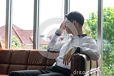 Financial problem concept. Young smart businessman has financial status depressed and anxious about cashflow and financial Stock Photo