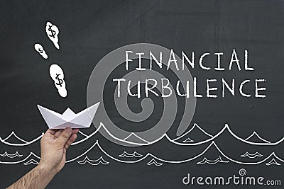 Financial turbulence concept on blackboard Stock Photo