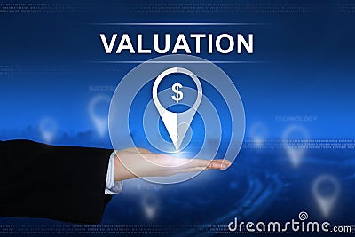 Financial valuation button on blurred background Stock Photo