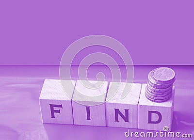 Find word Word Written In Wooden Cubes and coins. Business concept Stock Photo