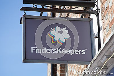 The Finders Keepers sign hanging from a wall in the UK Editorial Stock Photo