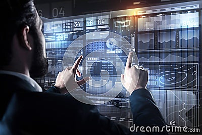 Experienced programmer touching the screen while finding connection Stock Photo