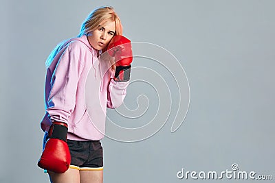 Finding harmony between elegance, femininity and fighting. Stock Photo