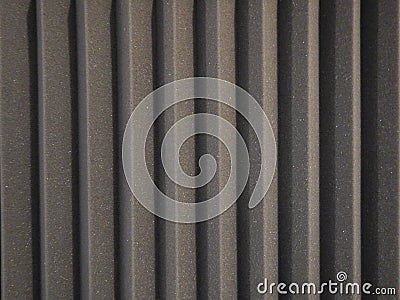 Acoustical foam or tiles for sound dampening. Music room. Soundproof room. Low key photo. Stock Photo