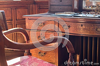 Fine antique pedestal writing desk. Studying history and period Stock Photo