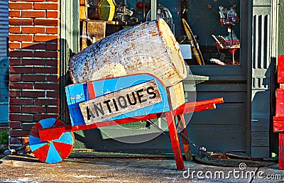 Antiques Shop Wheel Barrow Stock Photo