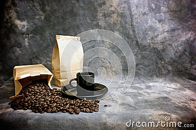 Fine art coffee cup whole beans and bags Stock Photo