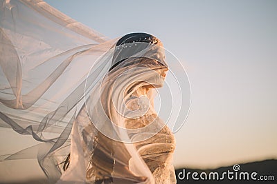 Beautiful bride outdoors in a forest Stock Photo