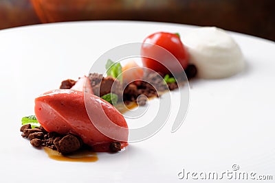 Fine dining dessert, Strawberry ice cream, chocolate mousse Stock Photo