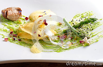 Fine dining, ravioli with asparagus and Porcini Stock Photo
