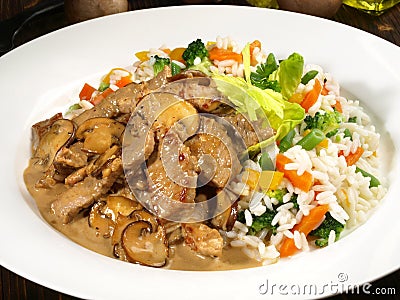 Sliced Veal Meat Zurich Style with Rice Stock Photo