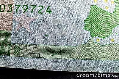 Fine microprint and serial number on hundred euro banknote protection against fraud Stock Photo