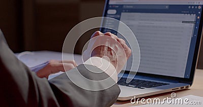 Searching necessary information, the worker hand points monitor. Stock Photo