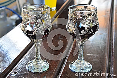 Red wine in branded wine glasses Stock Photo