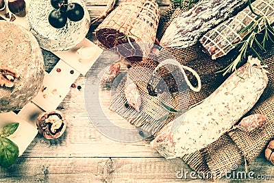 Fine selection of dry meat, sausages and French cheese. Food background Stock Photo