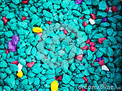 Fine turquoise pebbles. The background consists of small turquoise pebbles. With many possible uses. The texture consists of tiny Stock Photo